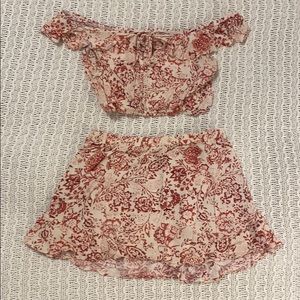 Off the shoulder crop top and matching mini skirt